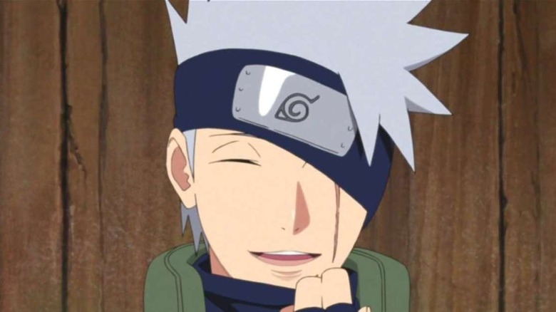Why does Kakashi hide his face?