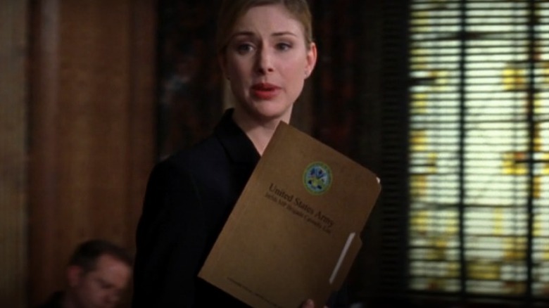 Casey Novak with folder