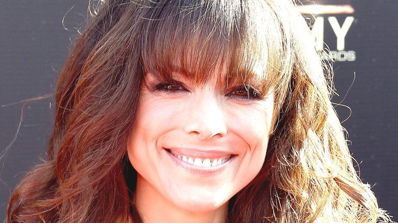 Liz Vassey looking very happy with life