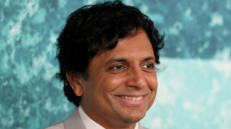 M. Night Shyamalan smiling