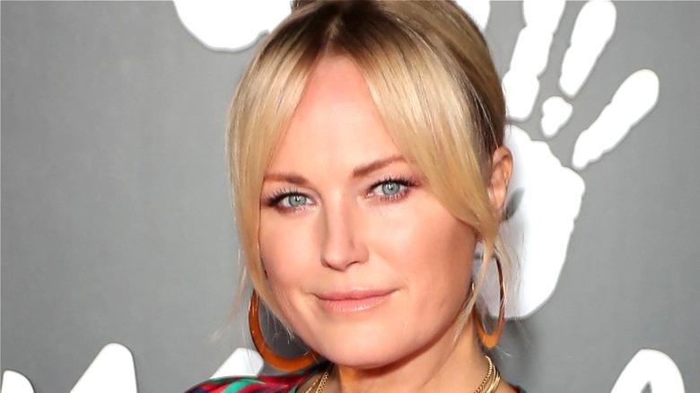 Malin Akerman looking into camera