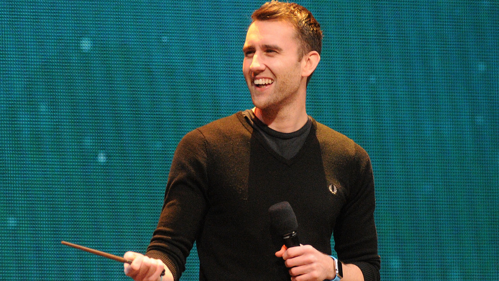 Matthew Lewis with a wand