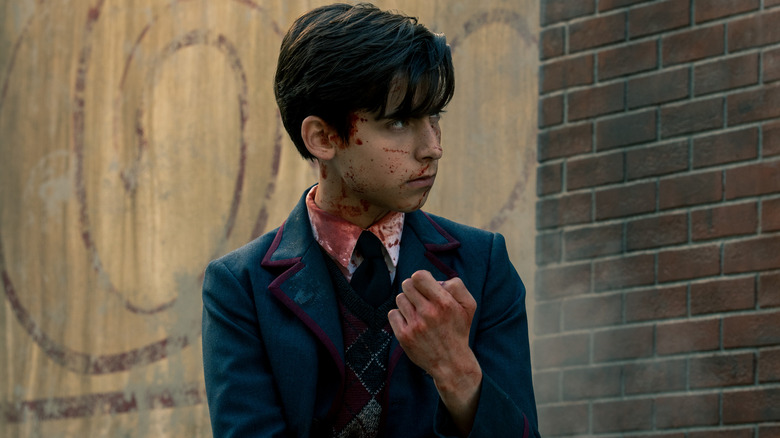 Number Five covered in blood 