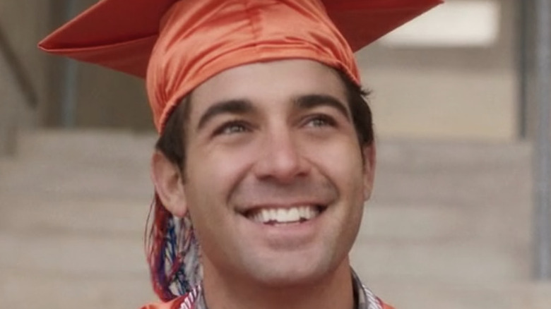 Joe smiling at Graduation