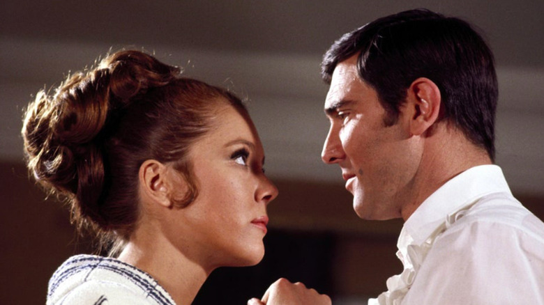 George Lazenby and Diana Rigg talking