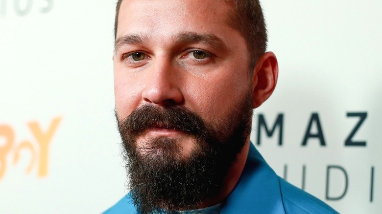 Shia LaBeouf wearing a blue suit 