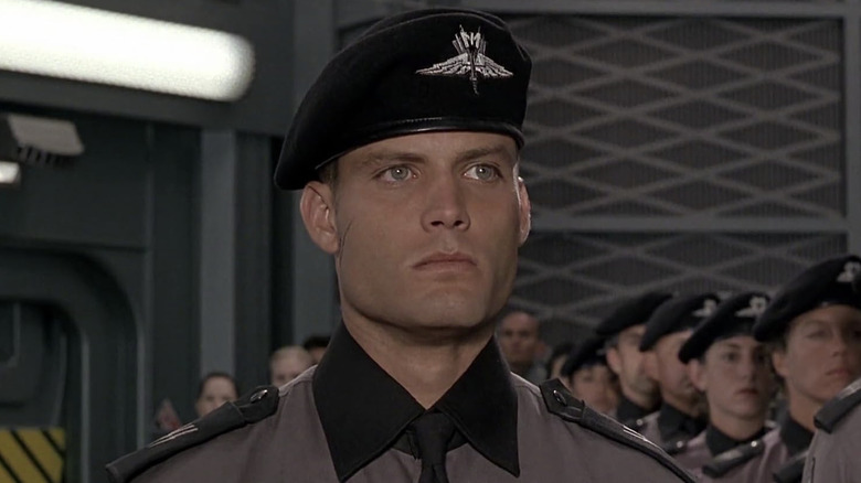 Johnny Rico stands at attention in 