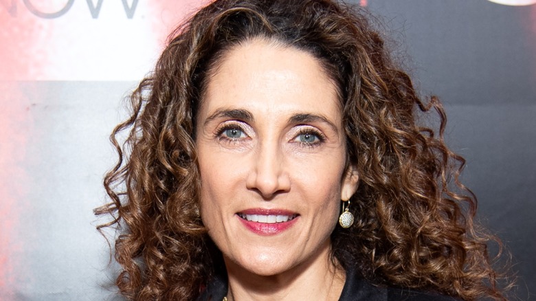 Melina Kanakaredes smiles 