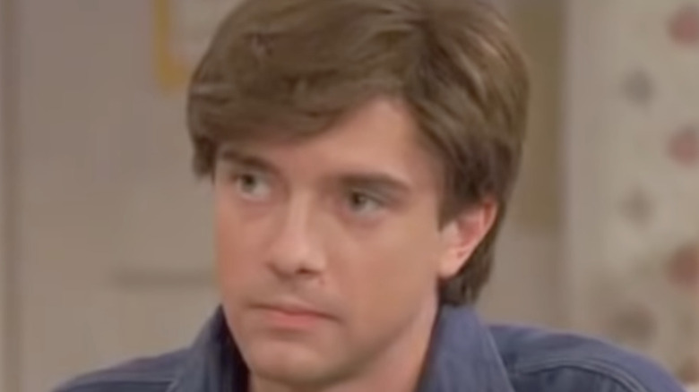 Eric Forman looking on
