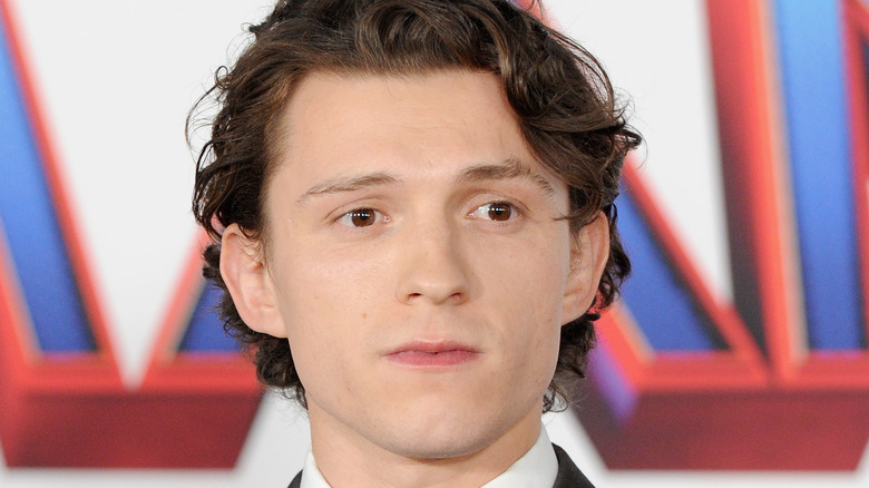 Tom Holland attends premiere