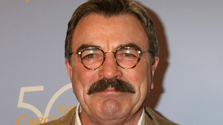Tom Selleck smiling at an event