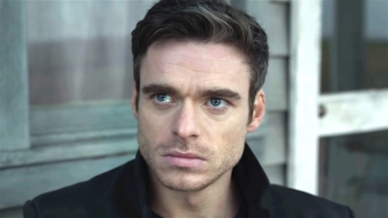 Richard Madden looking grim