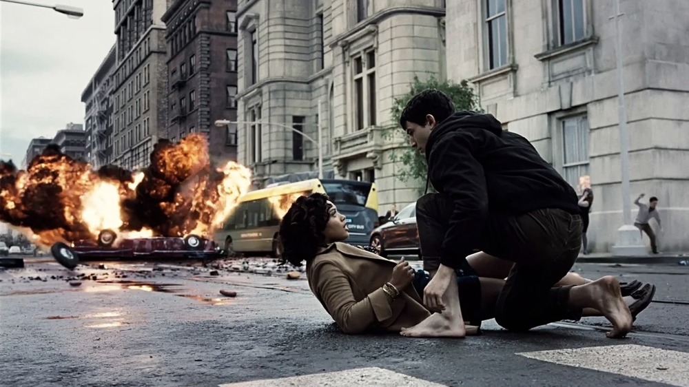 Flash (Ezra Mitchell) saves the girl in Zack Snyder's Justice League