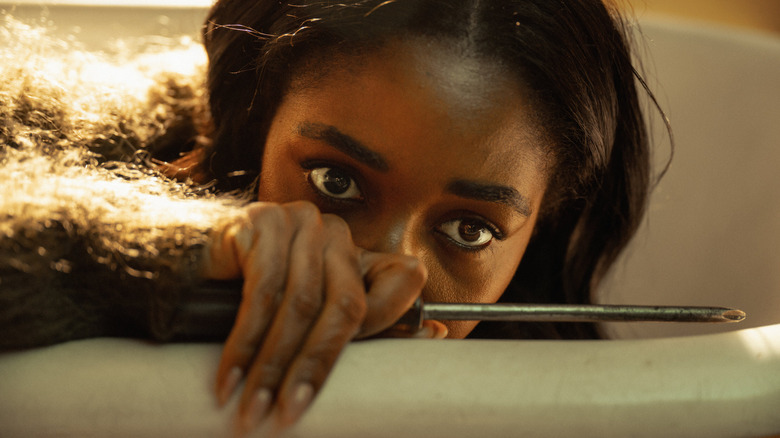 Ariel Ecton fighting for her life in Opus (2025)