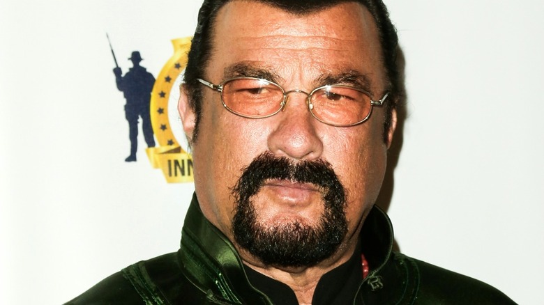 Steven Seagal with beard and glasses