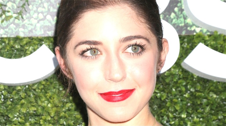 Annabelle Attanasio smile red lipstick CBS red carpet