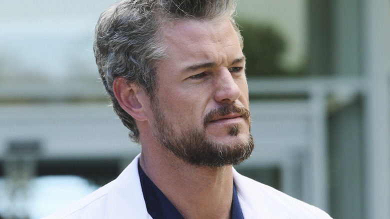 Mark Sloan looks to his left