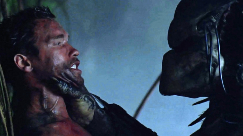 Predator holding Dutch in 1987's Predator