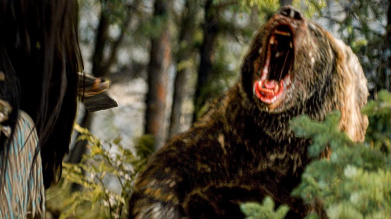 Predator facing a bear in Prey