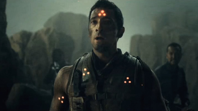 Royce covered in laser scopes in Predators