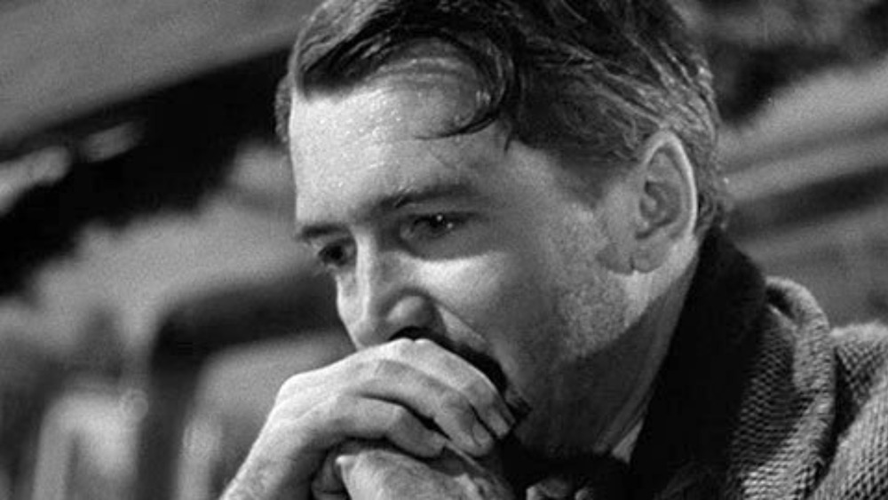 George Bailey (Jimmy Stewart) prays in It's a Wonderful Life