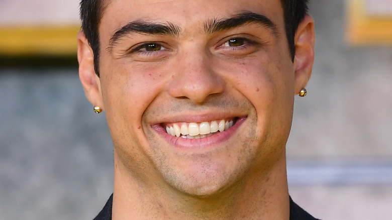 Noah Centineo smiling event 