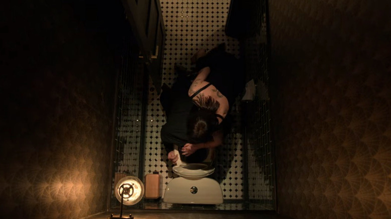 Laura Haddock giving a bad guy a swirly