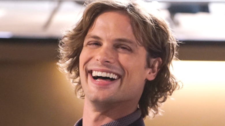 Dr. spencer reid smiling and laughing