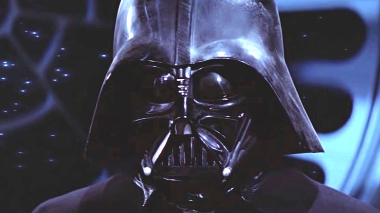 Darth Vader looking on