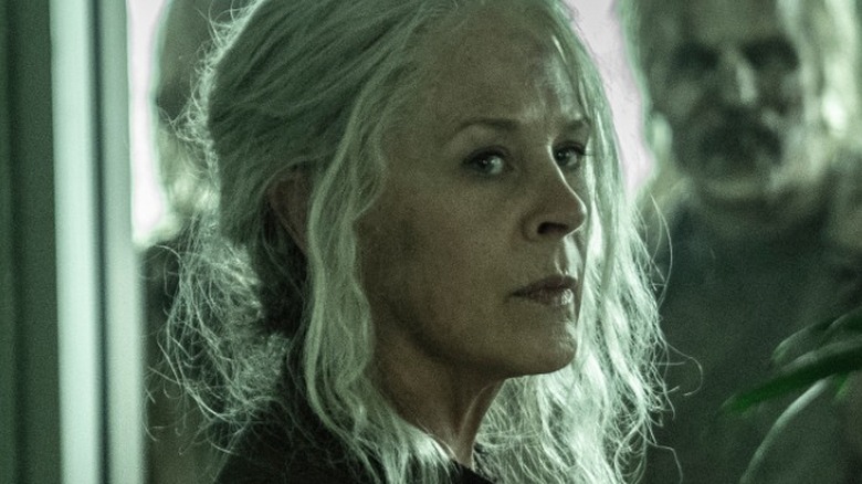 Carol sees zombies outside in the finale of The Walking Dead