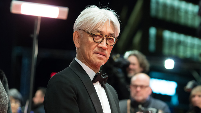 Ryuichi Sakamoto looking into camera