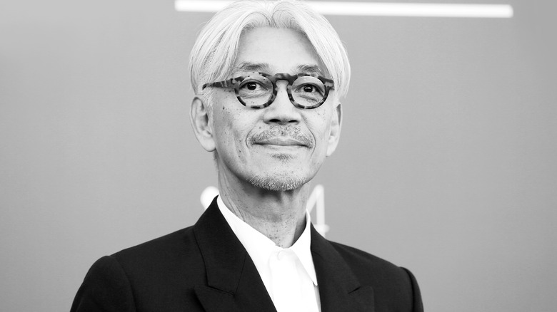 Ryuichi Sakamoto smiling
