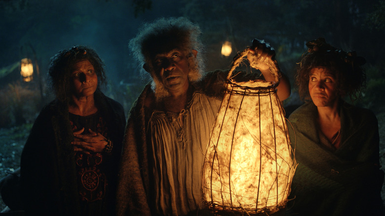 Sadoc Burrows holding a lantern