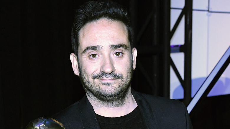 A headshot of J.A. Bayona smiling