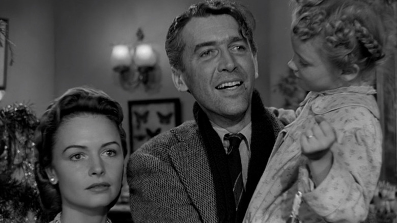 George Bailey smiling with his family 