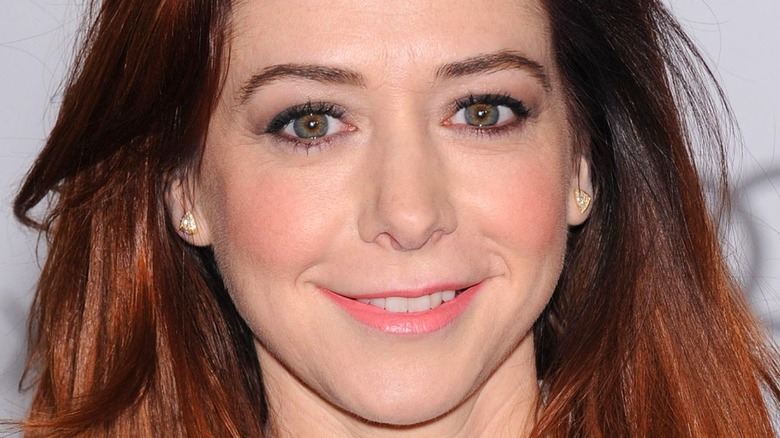 Redhead Alyson Hannigan smiling