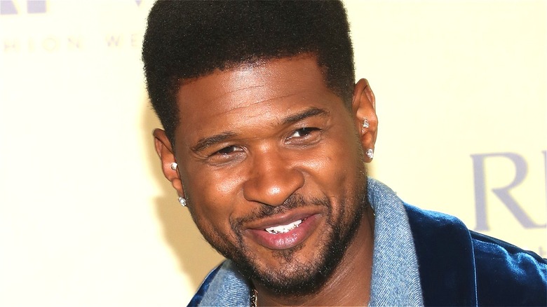 Usher posing