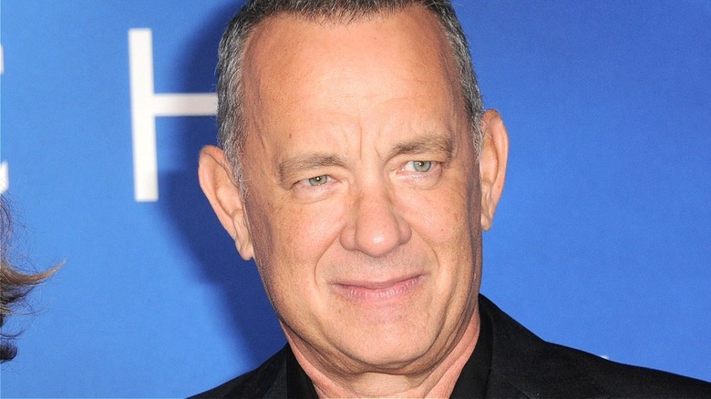 Tom Hanks almost smiling