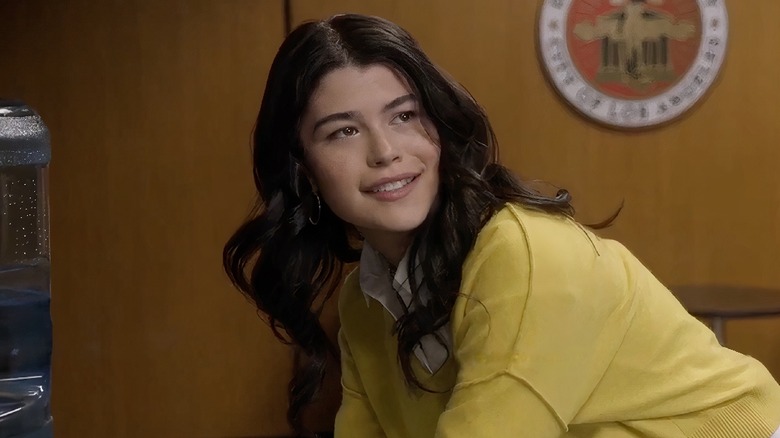 Tamara Collins wearing yellow sweater