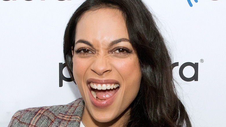 Rosario Dawson grinning