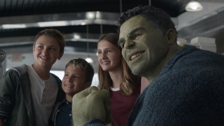 Smart Hulk posing for pictures with kids