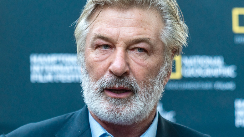 Alec Baldwin looking to his left