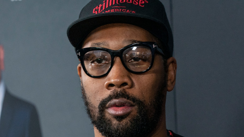 RZA in glasses and hat