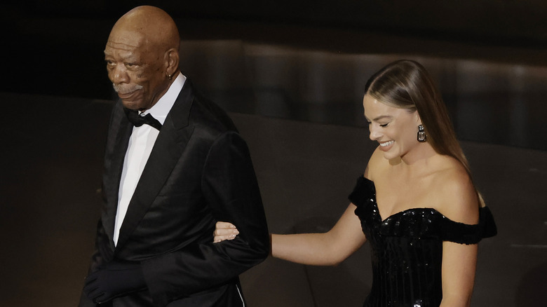 Morgan Freeman and Margot Robbie smiling