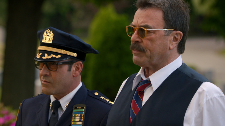 Frank and a fellow officer at a funeral