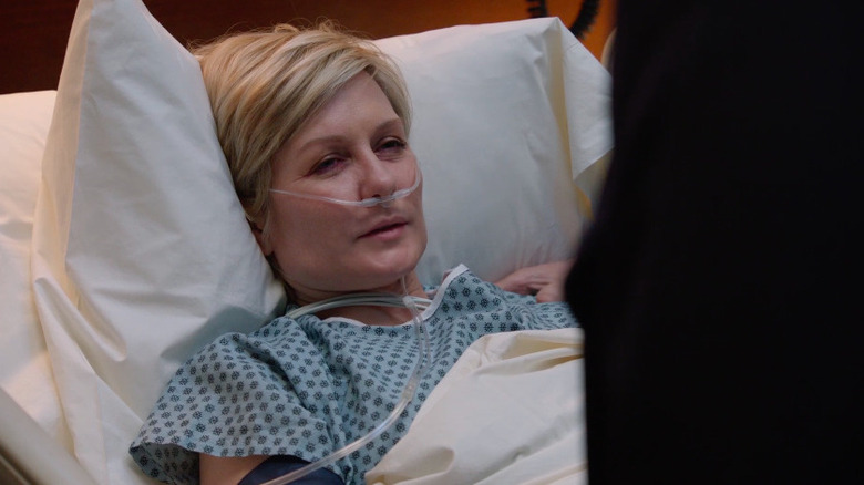 Linda in a hospital bed