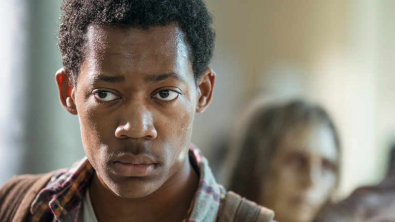 Noah looks stern staring at walkers