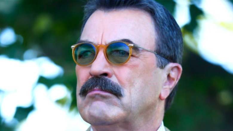 Frank from Blue Bloods wearing sunglasses