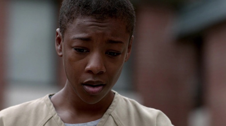Poussey Washington looks down