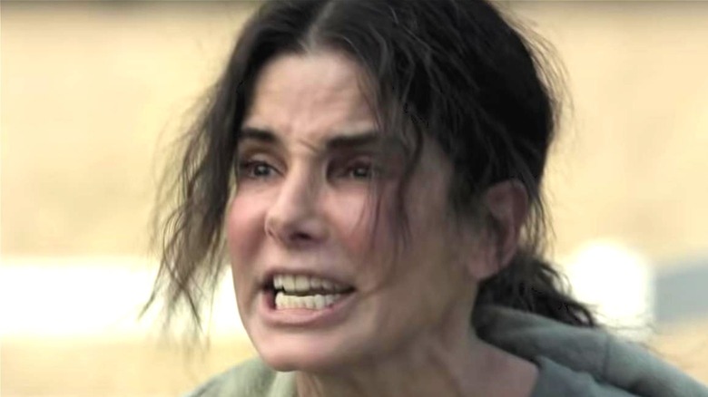 Sandra Bullock gritting her teeth and yelling